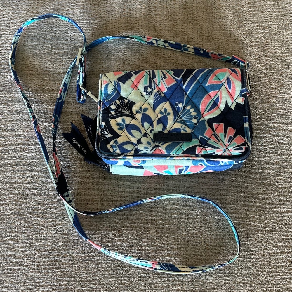 vera bradley cross body /wristlet purse 
both crossbody strap & wristlet strap